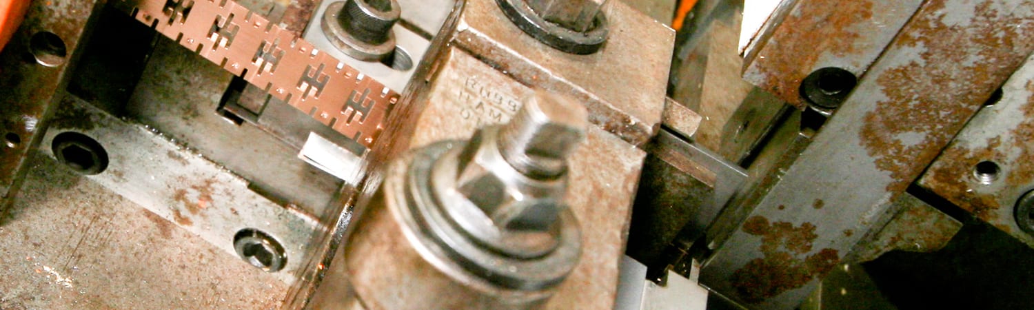 Custom metal stampings for various parts and materials.